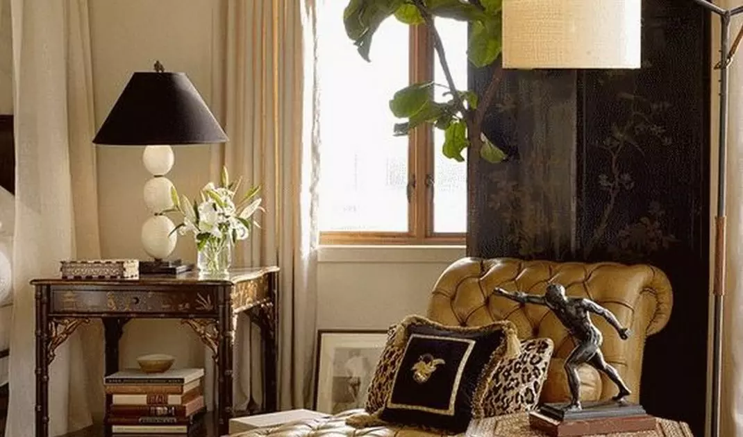 Colonial style chaise longue and ornate cabinets