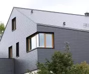 Cedral tiles on the roof and part of the facade of a single-family house in Ostelsheim, Germany.