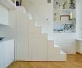 The staircase was inspired by the design of the stairs in the boat's cabins