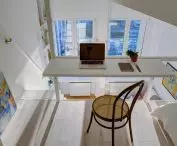 On the mezzanine there is a folding desk for work