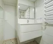 Resin fragments are embedded in the floor tiles