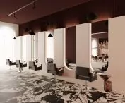 Hairdressing stations, characteristic elements are oval, illuminated mirrors