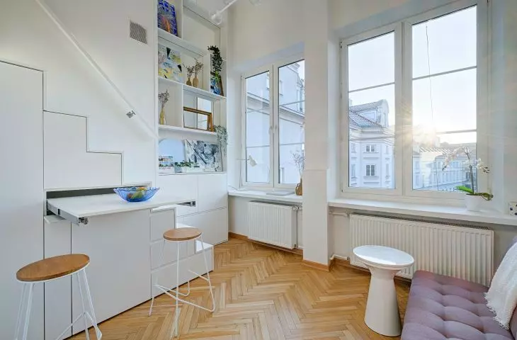 A distinctive feature is the renovated, century-old wooden floor