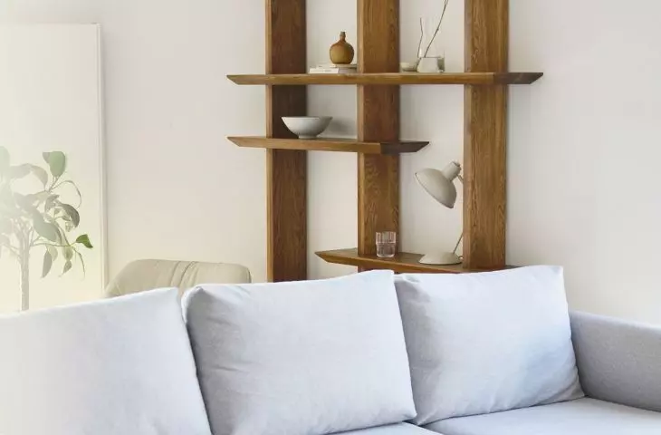 Living room space, blue sofa reigns here