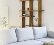 Living room space, blue sofa reigns here