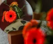 Reflecting vase, terrazzo top