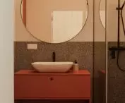 The interior of the bathroom also relates to the whole apartment
