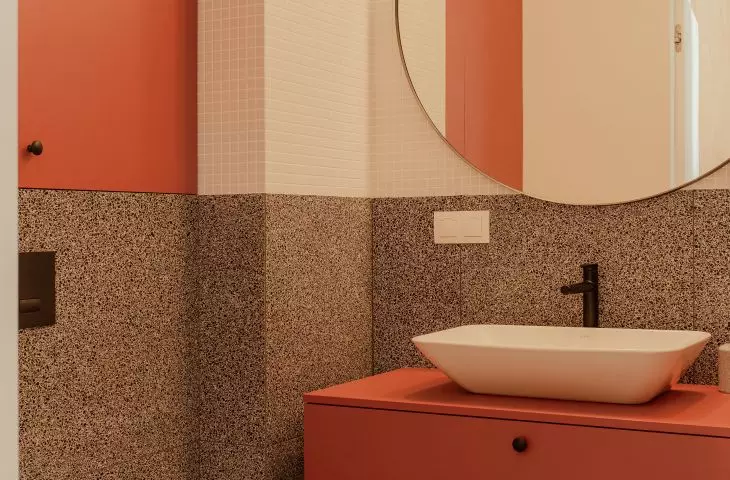 Bathroom with warm color accents
