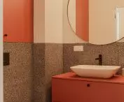Bathroom with warm color accents