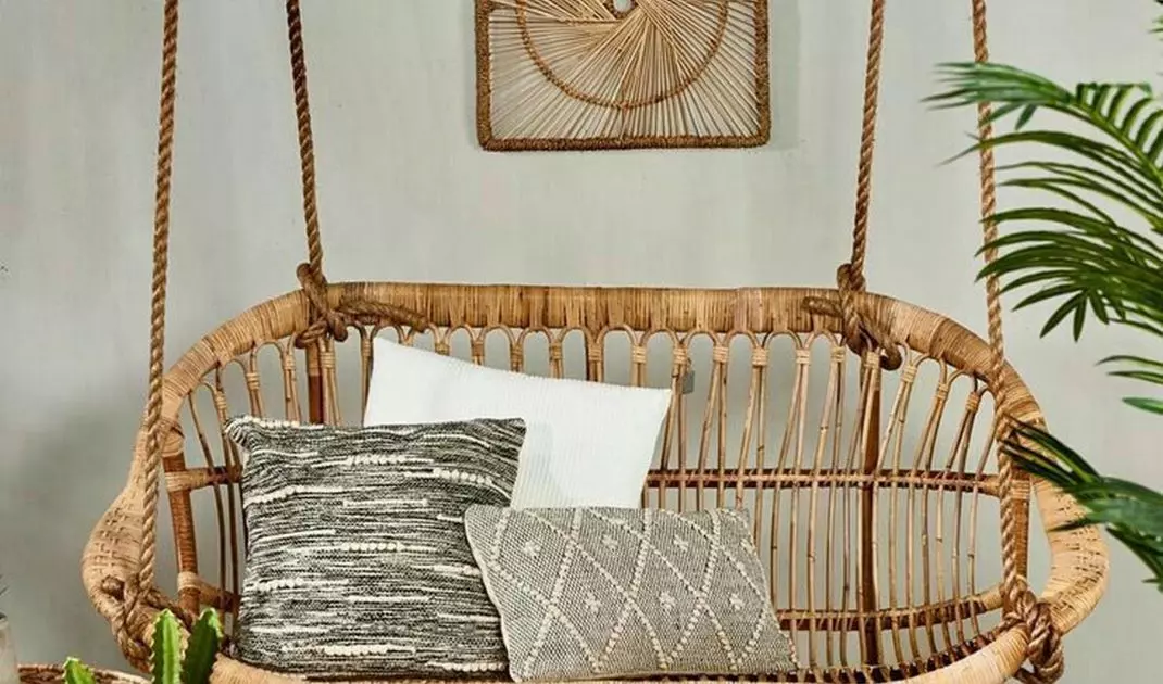 Wide wicker swing