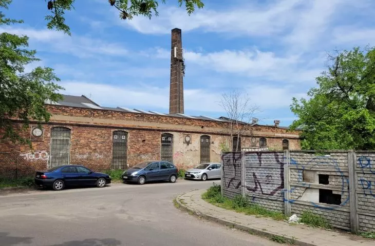 The buildings of the former factory from the south side, the boiler room chimney is visible
