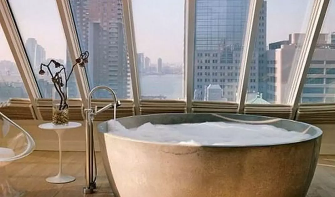 Stone bathtub in a modern interior