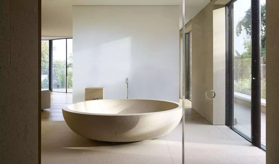 Stone bathtub in a minimalist design