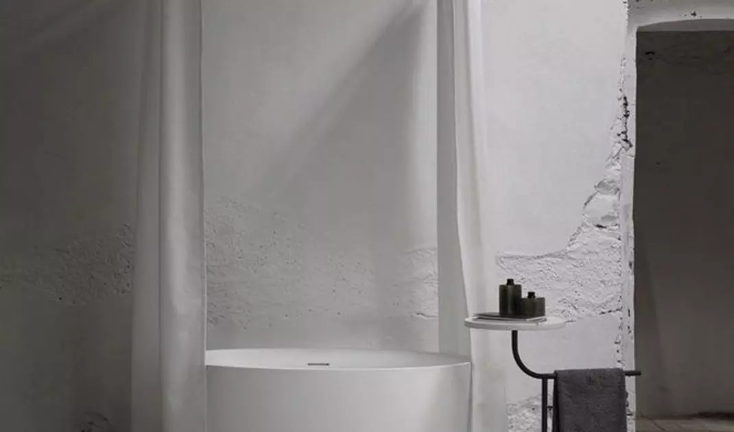 Bathtub, which also serves as a shower tray