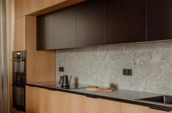 The main themes of the interior are wood and terrazzo