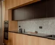 The main themes of the interior are wood and terrazzo