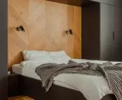 The bedroom is kept in contrasting colors