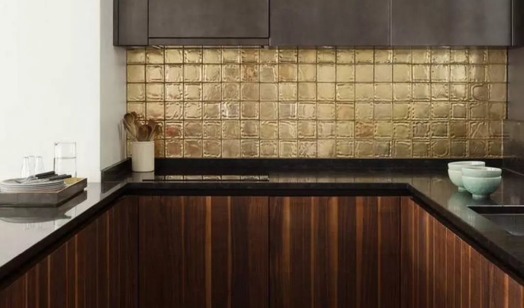 Gold-colored wall tiles