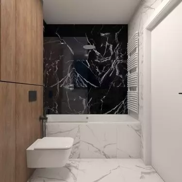 Black and white bathroom design visually warmed by built-in cabinets made of wood