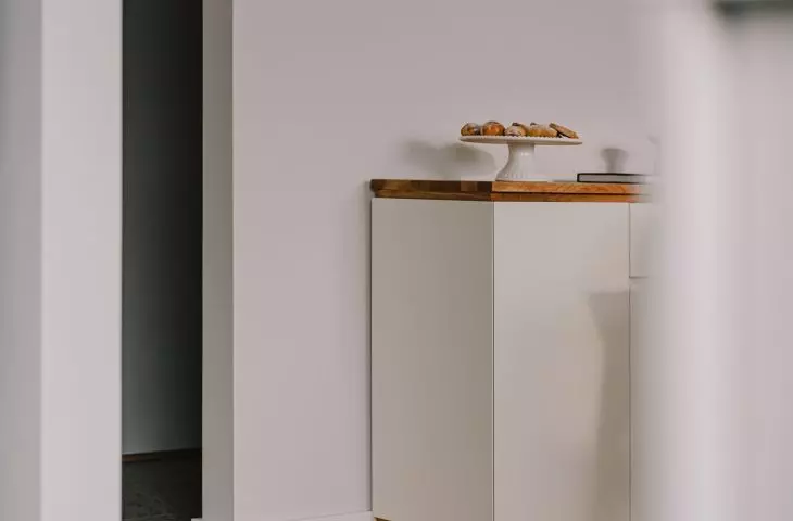 A fragment of the living room and wooden floor