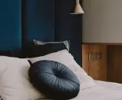 Upholstered panels behind the bed
