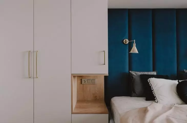 The wall of the bedroom was used for furniture development