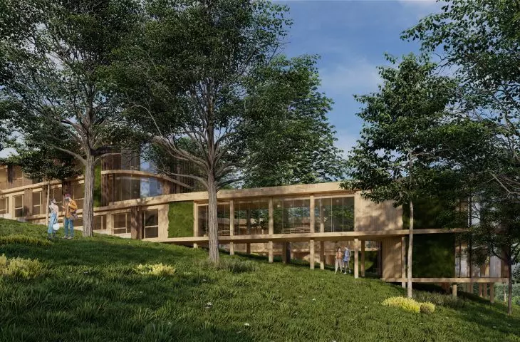 The body of the building consists of terraces going down the hill