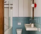 Bathroom decorated with a contemporary interpretation of wainscoting