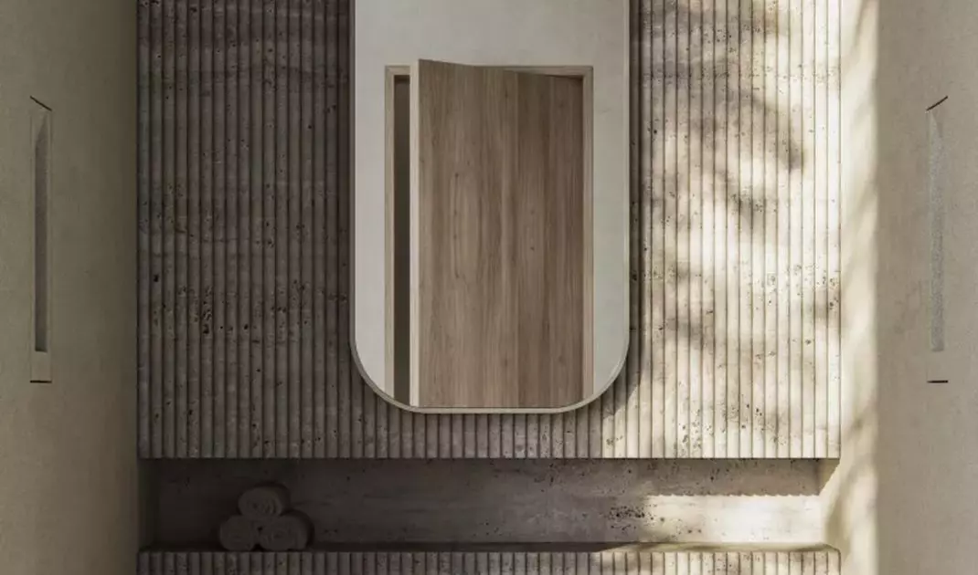 Stone washbasin amid aesthetically fluted tiles