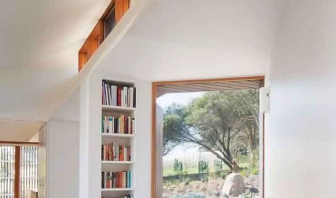 A wide windowsill can become a comfortable place to read