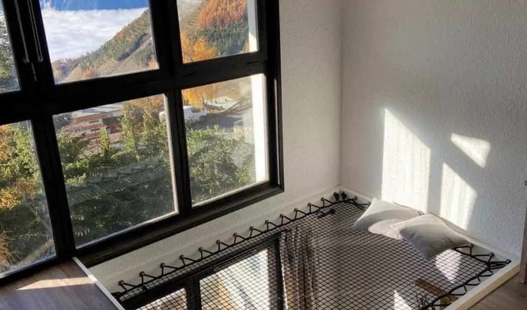 Hammock net stretched at window level