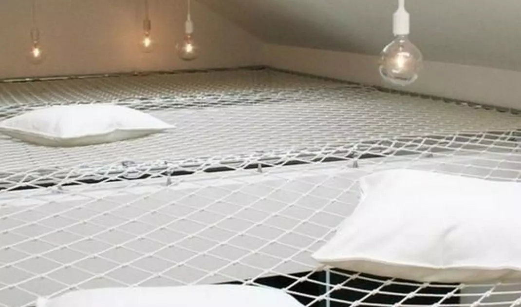 A hammock net ceiling is a great idea to use the space under the roof