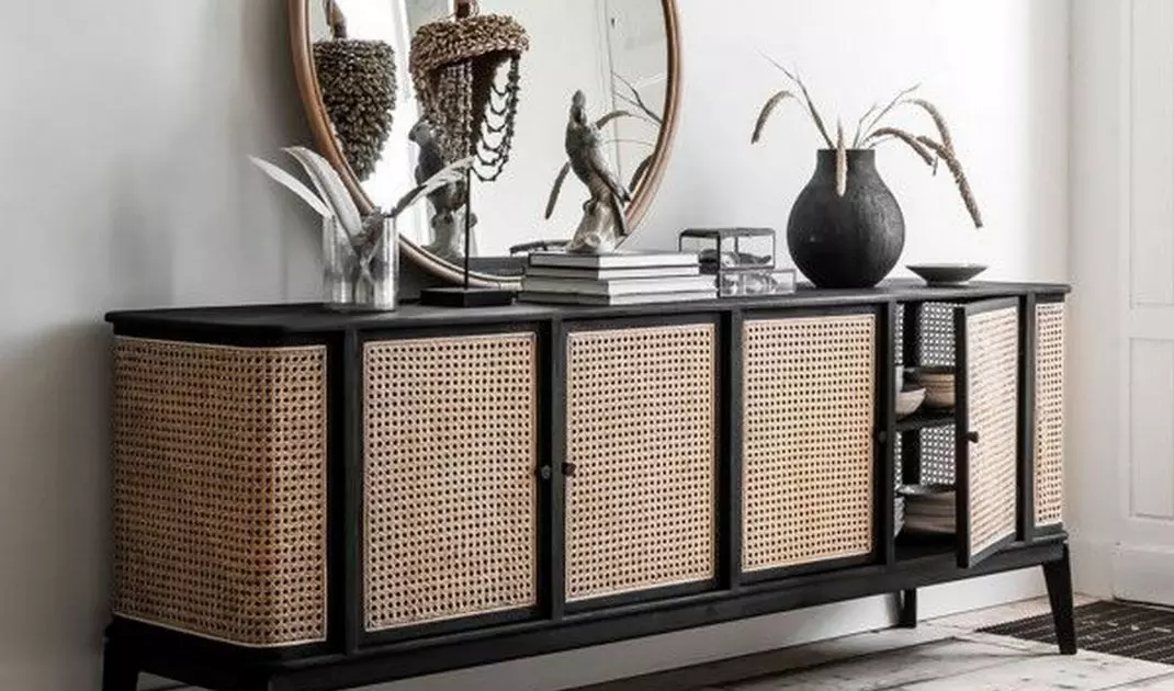 Rattan cabinet in a black frame
