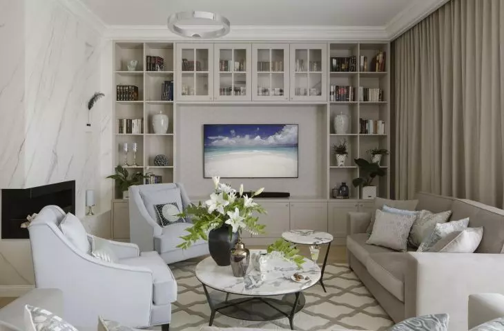 Placing bookcases around the TV will create a place to store all the things we need