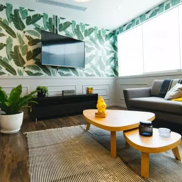Wallpaper is a great way to make a TV wall stand out