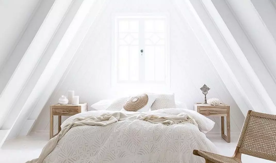 Bedroom with window at the top of the building