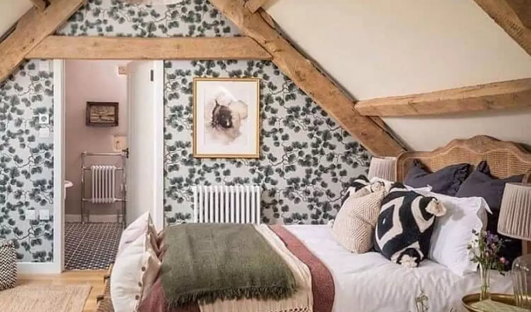 Bedroom with bathroom in the attic