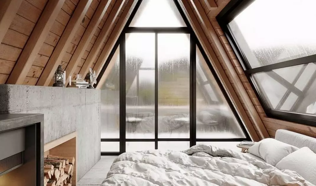 Bedroom with window at the top of the building