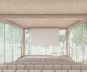 The auditorium is surrounded by a forest