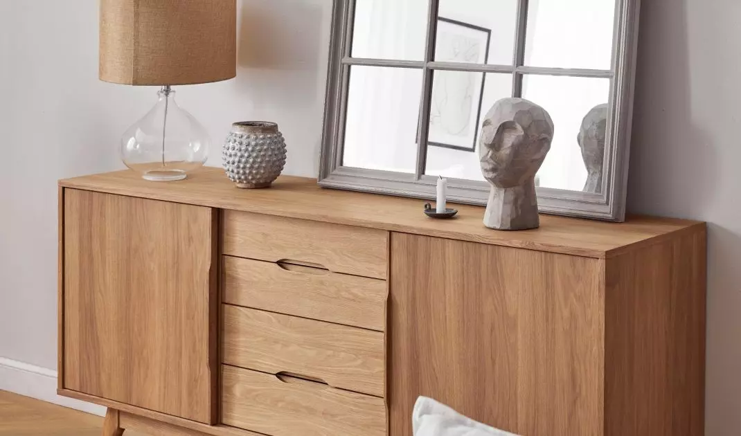 A large mirror will be an interesting addition to the subdued styling 