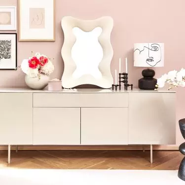 The chest of drawers is the perfect place to display designer trinkets and favorite decorations