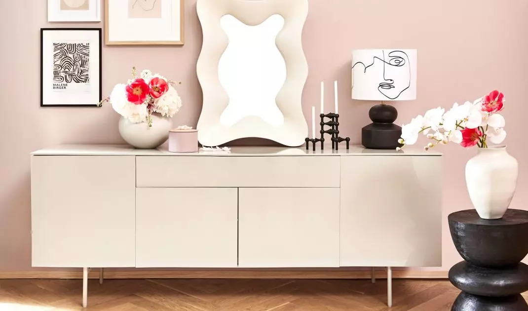 The chest of drawers is the perfect place to display designer trinkets and favorite decorations