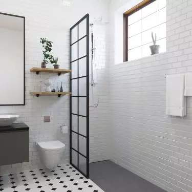 Glass wall can separate bathroom zones