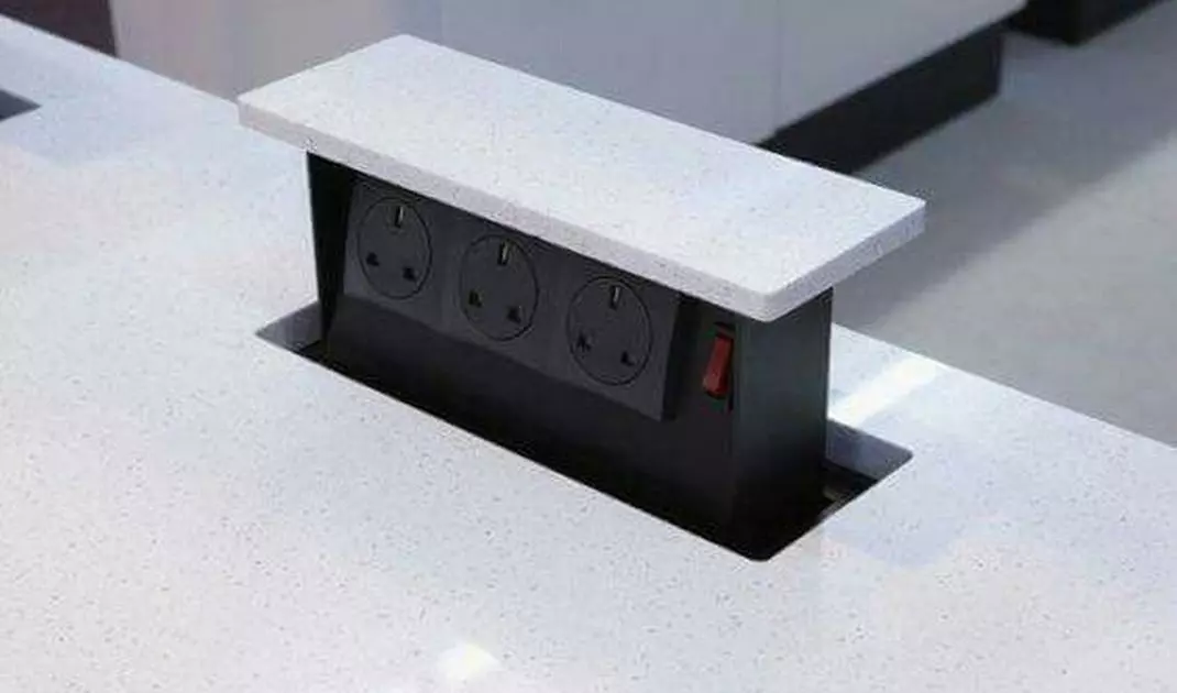 Electrical outlet hidden in the countertop