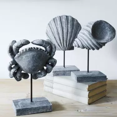Decoration with shells and crab brings to mind time spent at the beach