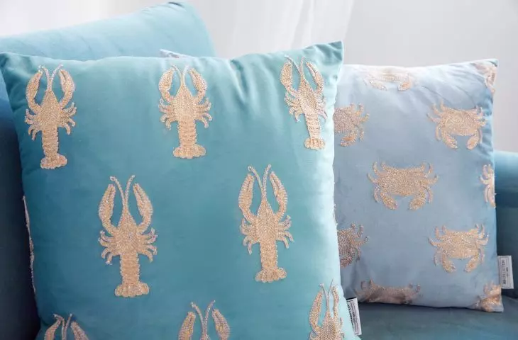 Cushions with an intriguing pattern will give your living room a seaside feel 