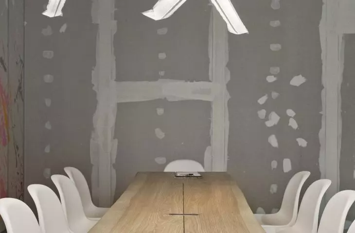 the interior of the austere conference room