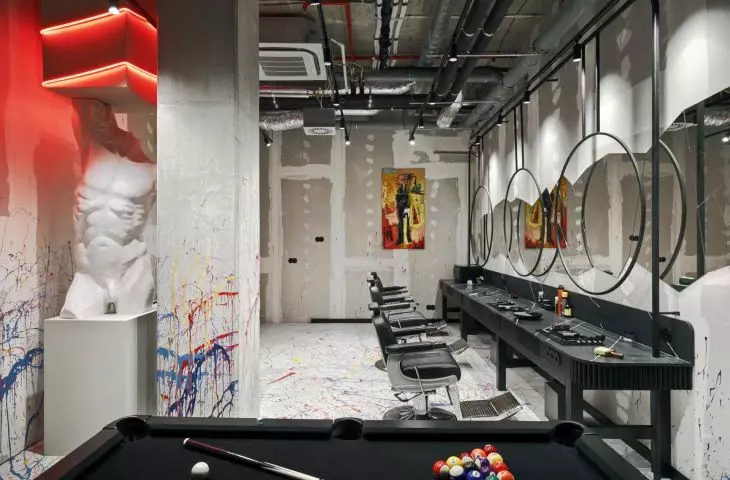 in the barber's section, a space has been set aside for a pool table