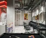 in the barber's section, a space has been set aside for a pool table