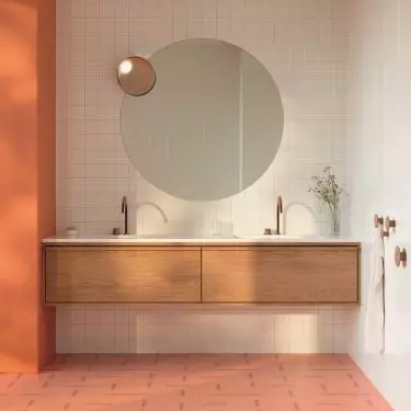 Smooth tiles on the walls combined with patterned tiles on the floor